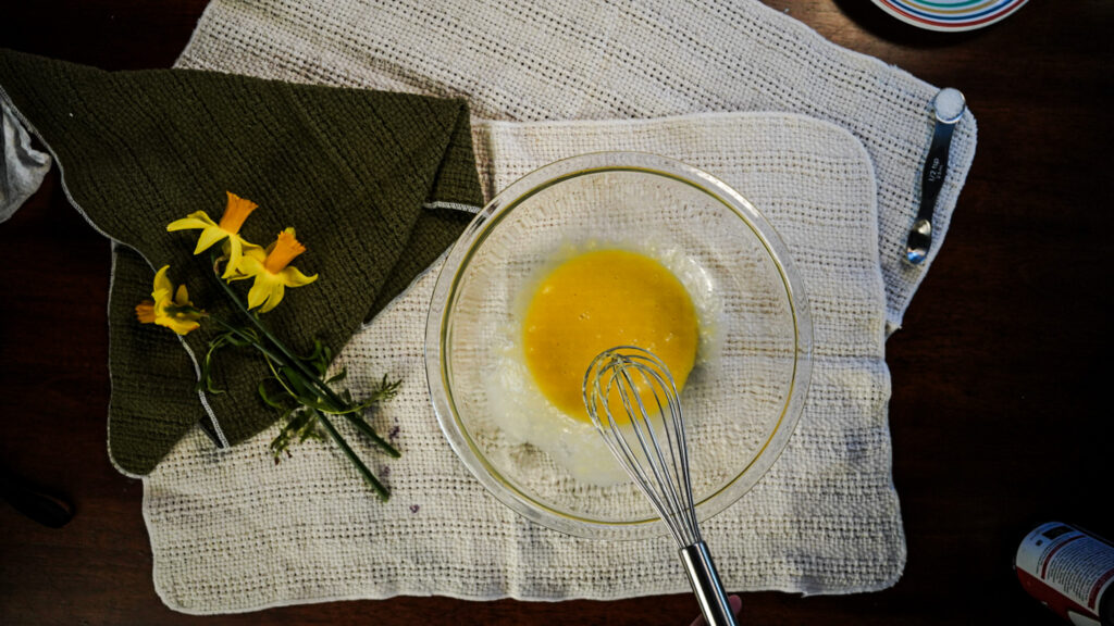 An egg and butter mixture sitting on a white towel